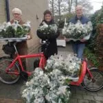 Voor Mekaar zet vrijwilligers in de bloemen