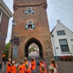 Vrijwilligers gezocht die de (Dijk)poort bewaken en gasten verzorgen